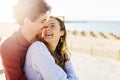 Happy young couple in love looking at each other at beach Royalty Free Stock Photo