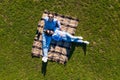 Happy young couple in love lying in the park together on blanket from above, Aerial view Royalty Free Stock Photo