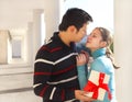 Happy young couple in love with present Royalty Free Stock Photo