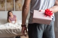 happy young couple in love suprising each other with gifts Royalty Free Stock Photo