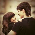 Happy young couple in love walking on city street Royalty Free Stock Photo