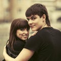 Happy young couple in love walking on city street Royalty Free Stock Photo