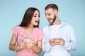 Young couple with mobile phones Royalty Free Stock Photo