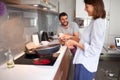 Happy couple in morning celebratin valentines day in kitchen. sexy and in love Royalty Free Stock Photo