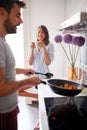 Happy couple in morning celebratin valentines day in kitchen. sexy and in love Royalty Free Stock Photo