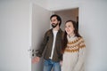 Young couple moving in new flat, new home and relocation concept.