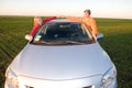 Happy young couple with new car Royalty Free Stock Photo