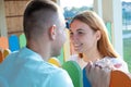 Happy young couple outdoors. Girl and boy looking at each other Royalty Free Stock Photo