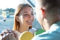 Happy young couple outdoors. Girl and boy looking at each other Royalty Free Stock Photo