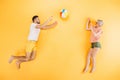 happy young couple playing with beach ball Royalty Free Stock Photo