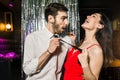 Happy young couple posing together at nightclub Royalty Free Stock Photo