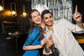 Happy young couple posing together at nightclub Royalty Free Stock Photo