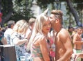 Happy young couple at Pride Parade