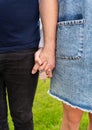 Happy young couple rejoices in buying an apartment, the couple holds in their hands the keys to their new home. Buying a Royalty Free Stock Photo