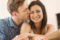 Happy young couple relaxing on the couch Royalty Free Stock Photo