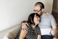 Happy young couple relaxing at home Royalty Free Stock Photo