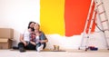 Happy young couple relaxing after painting Royalty Free Stock Photo