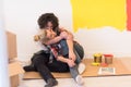 Happy young couple relaxing after painting Royalty Free Stock Photo