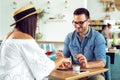 Happy couple at restaurant eating lunch, having fun Royalty Free Stock Photo