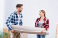 happy young couple in room during Royalty Free Stock Photo