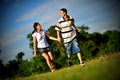 Happy young couple running outdoor Royalty Free Stock Photo