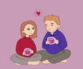 happy young couple sitting on the floor, looking at each other with a loving look, enjoying delicious tea on a pink background. a Royalty Free Stock Photo