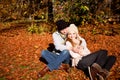 Happy young couple smilin in autumn outdoor