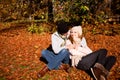 Happy young couple smilin in autumn outdoor