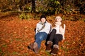 Happy young couple smilin in autumn outdoor