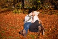 Happy young couple smilin in autumn outdoor