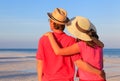 Happy young couple on summer beach