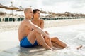 Happy young couple sunbathing Royalty Free Stock Photo