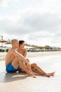 Happy young couple sunbathing Royalty Free Stock Photo