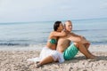 Happy young couple sunbathing Royalty Free Stock Photo