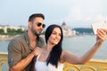 Happy young couple taking selfie at Budapest Royalty Free Stock Photo