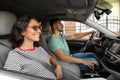 Happy young couple traveling by family car Royalty Free Stock Photo