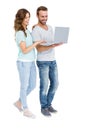 Happy young couple using laptop Royalty Free Stock Photo