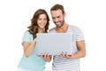 Happy young couple using laptop Royalty Free Stock Photo