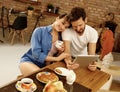 Happy couple with tablet Royalty Free Stock Photo