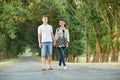 Happy young couple walk on country road outdoor, romantic people concept, summer season Royalty Free Stock Photo