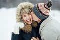 Happy Young Couple in Winter Park having fun.Family Outdoors. love Royalty Free Stock Photo