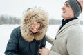 Happy Young Couple in Winter Park having fun.Family Outdoors. love Royalty Free Stock Photo