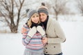 Happy Young Couple in Winter Park having fun.Family Outdoors. love Royalty Free Stock Photo