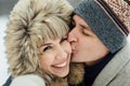 Happy Young Couple in Winter Park having fun.Family Outdoors. love Royalty Free Stock Photo