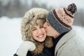 Happy Young Couple in Winter Park having fun.Family Outdoors. love Royalty Free Stock Photo