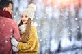 Happy Young Couple in Winter Park laughing and having fun. Family Outdoors. Copycpace. Royalty Free Stock Photo