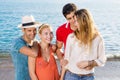 Happy Young Couples at the Beach.