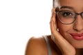 Happy young dark skinned woman with eyeglasses Royalty Free Stock Photo