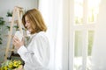 Happy young drinking coffee. Fresh, comfortable. Royalty Free Stock Photo