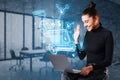 Happy young european woman using laptop with abstract glowing seo hologram on blurry office interior background. Search engine Royalty Free Stock Photo